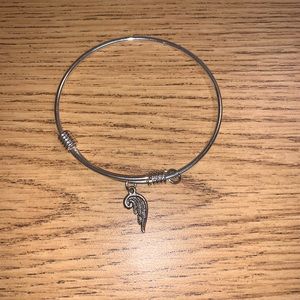 Alex and Ani Silver bangle with a wing charm